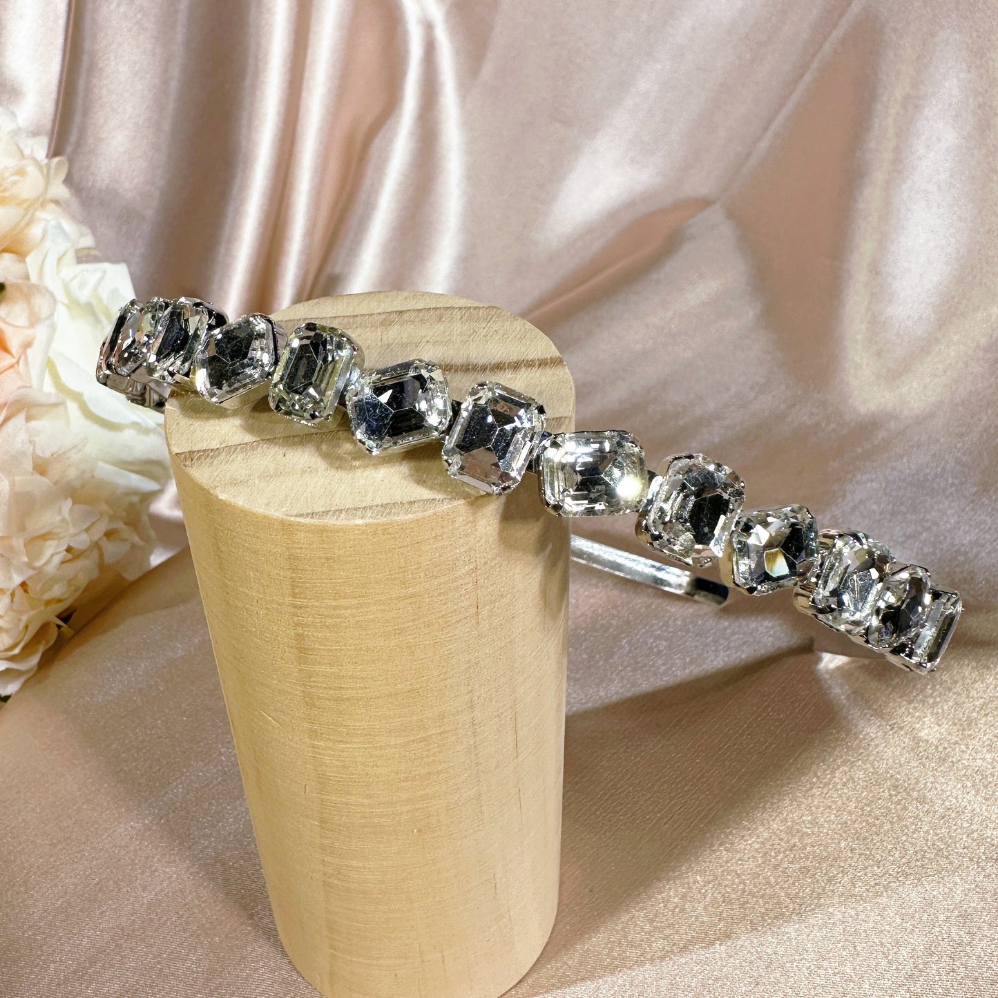 #23122773 Upgrade your look with our Deluxe Emerald Rhinestone Headband
