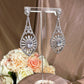 #11532010  Brilliant Round Cut Cubic Zirconia Drop Earrings