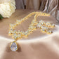 23902003 Charme antique : Collier et boucles d'oreilles pendantes de luxe en oxyde de zirconium au design d'inspiration vintage (disponible en argent, or et or rose)