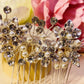 # 06442057 Peigne à cheveux en strass (argent, or et or rose)