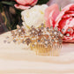 # 06442057 Peigne à cheveux en strass (argent, or et or rose)