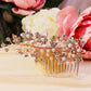 # 06442057 Peigne à cheveux en strass (argent, or et or rose)